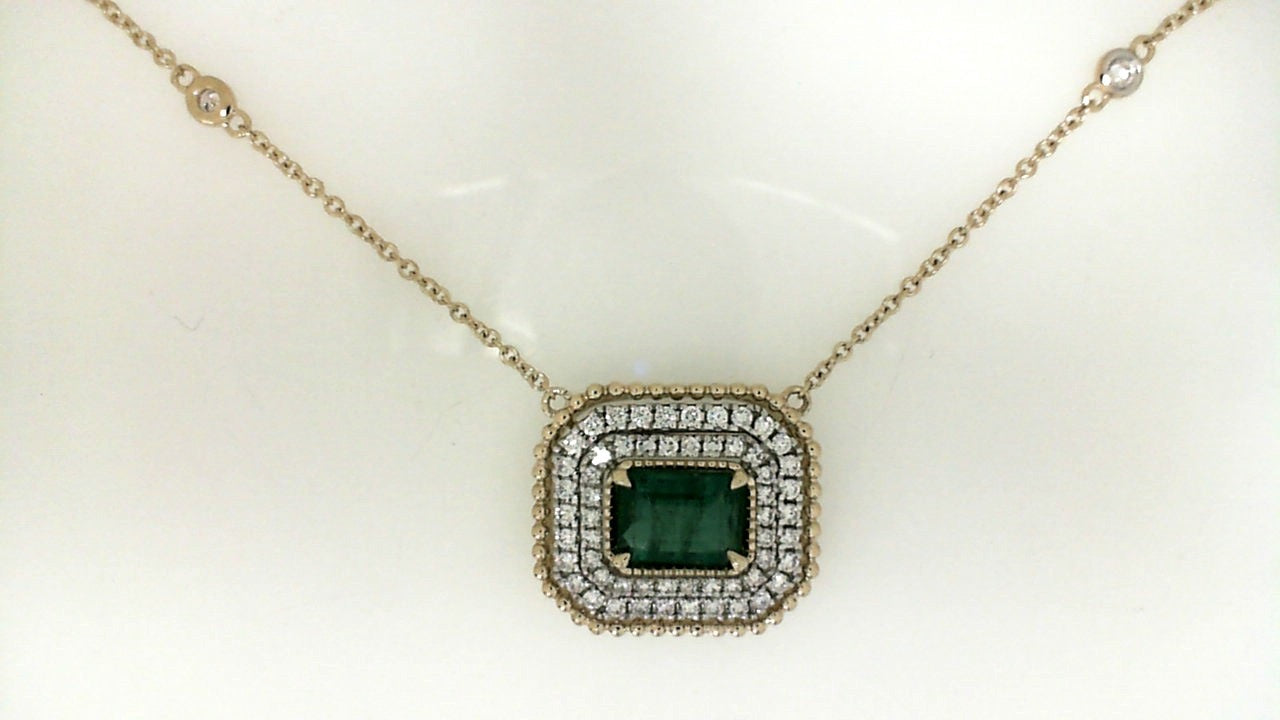 Two Tone Emerald and Diamond Double Halo Pendant